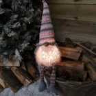 Samuel Alexander 50cm Christmas Sitting Male Light Up LED Gonk with Dangly Legs in Striped Hat