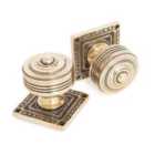 From The Anvil Aged Brass Tewkesbury Square Mortice Knob Set